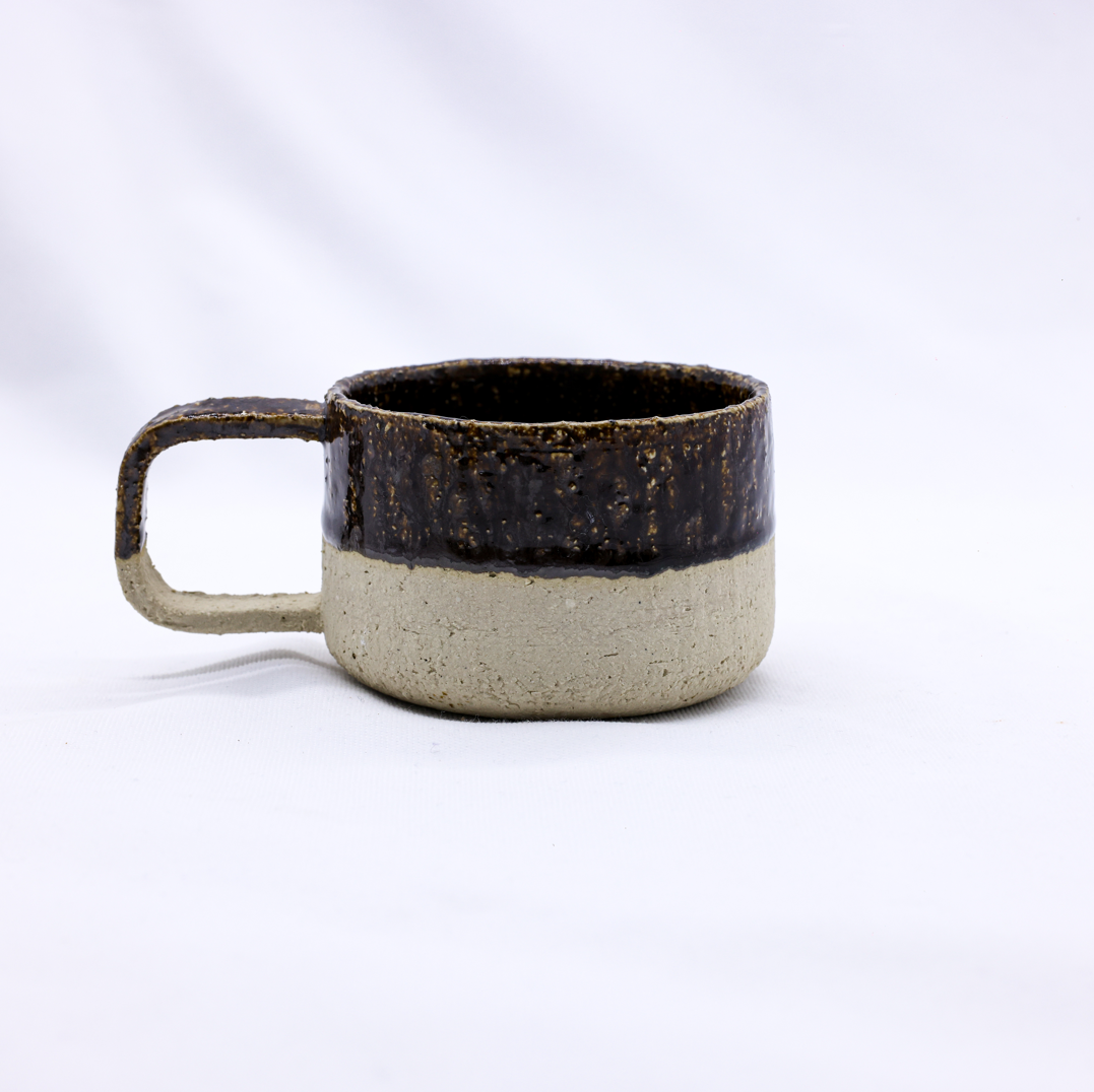 Ceramic mug with a dark brown top and light brown bottom