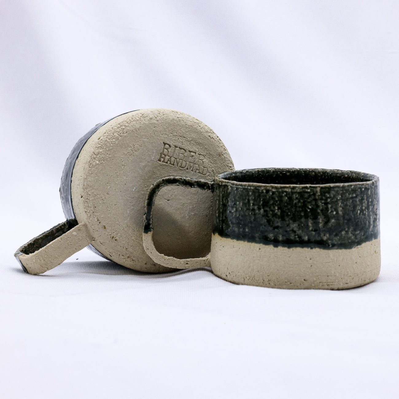 Ceramic mug with a textured surface on a white background