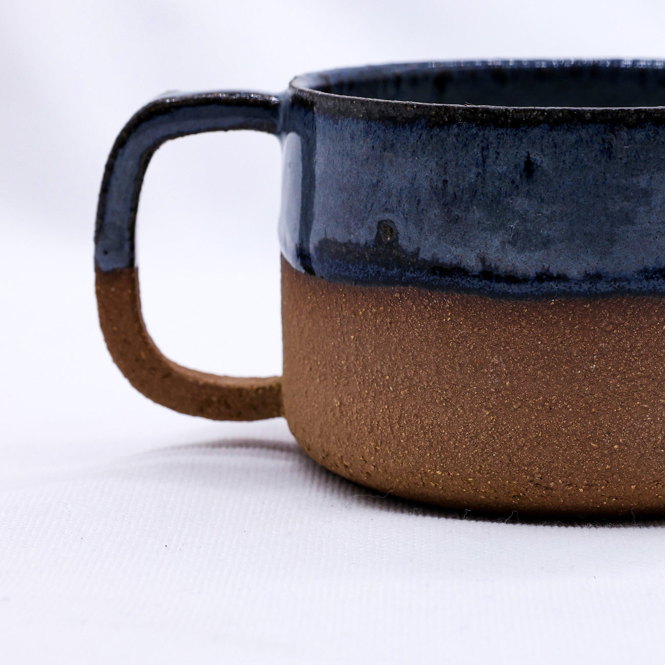 Ceramic mug with a two-tone design