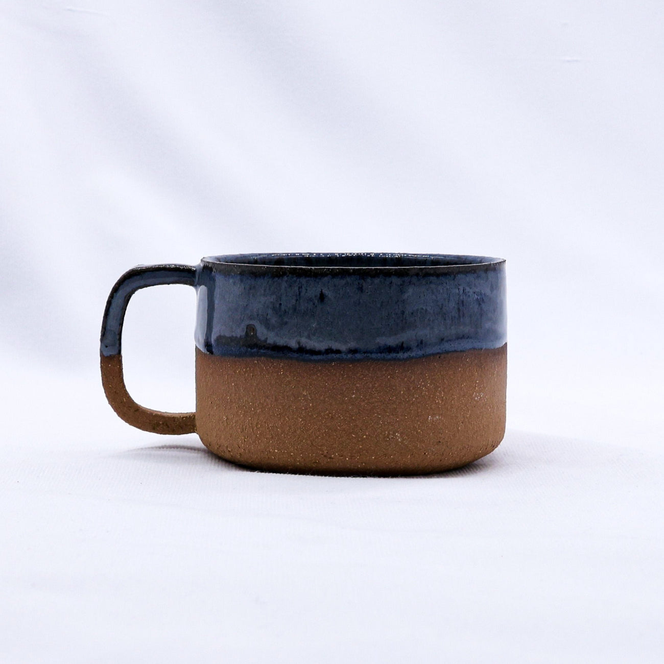 Ceramic mug with a two-tone design