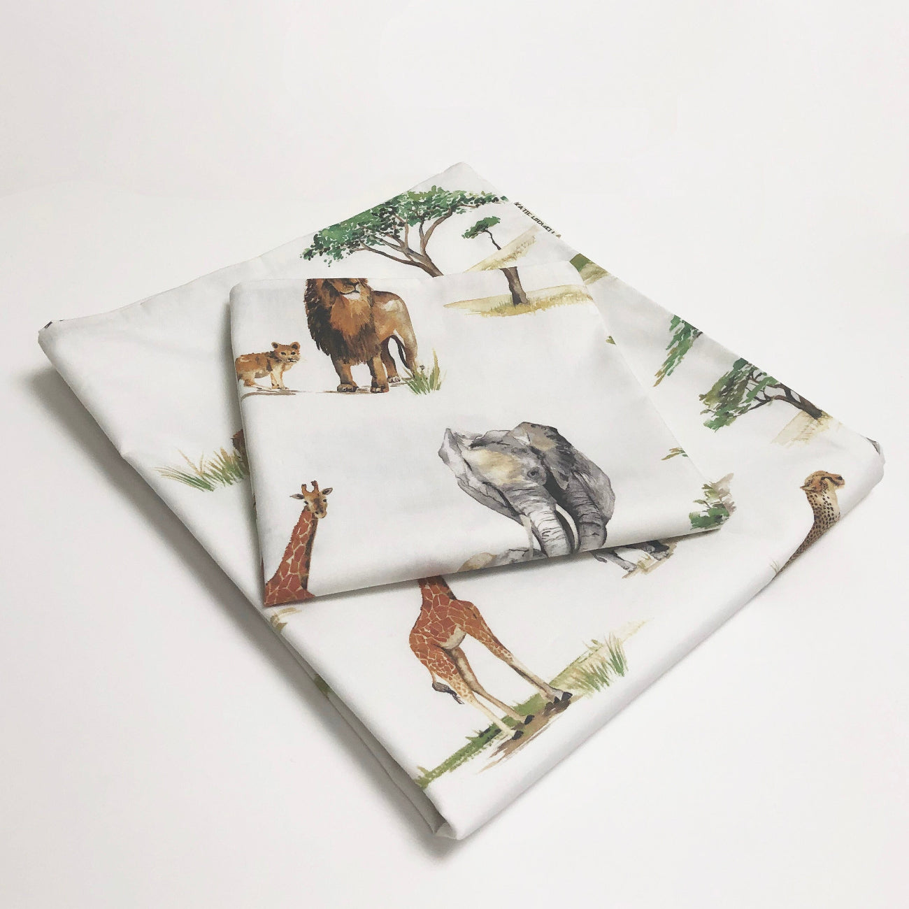 Folded fabric with animal pattern on a white background