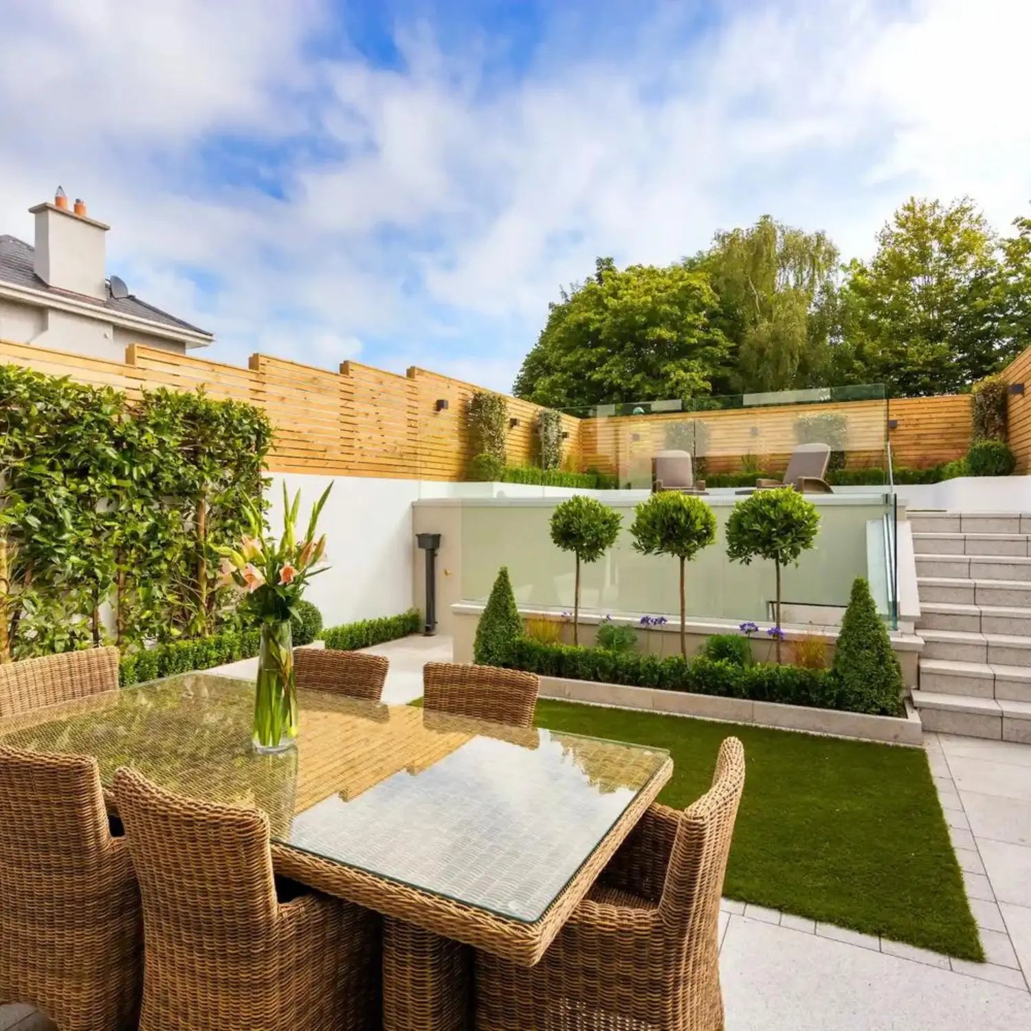 What colour fence paint makes a garden look bigger