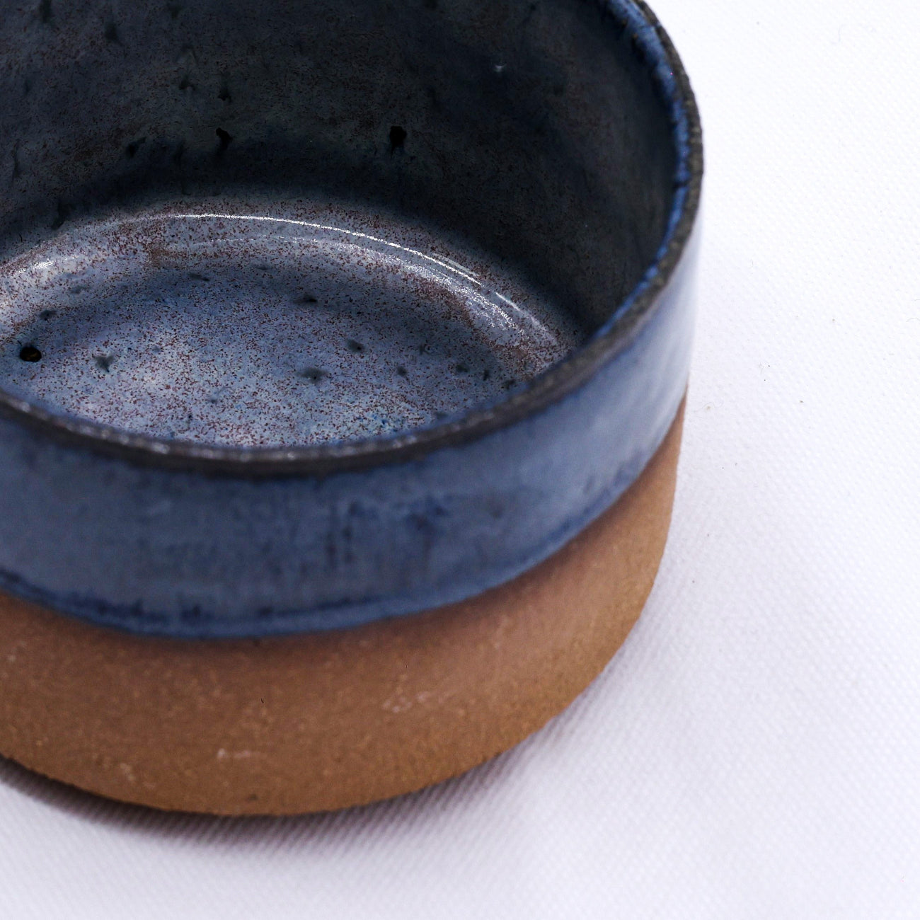 Ceramic mug with blue interior and terra exterior