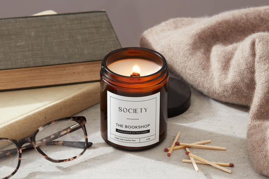 Cosy bookshop ambiance with soy wax candle