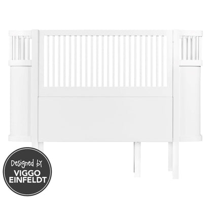 White wooden cot junior bed