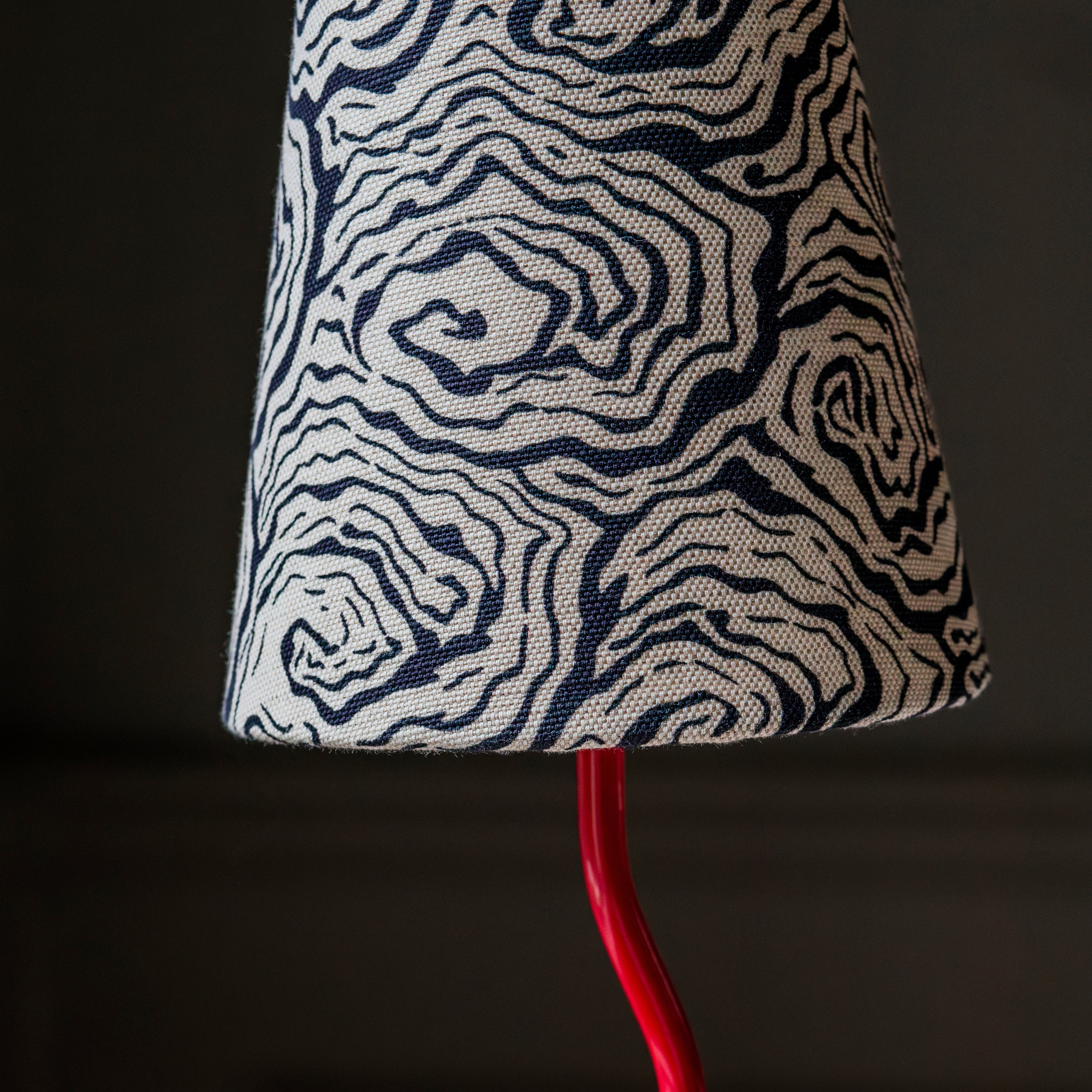 Lampshade with a unique pattern on a dark background