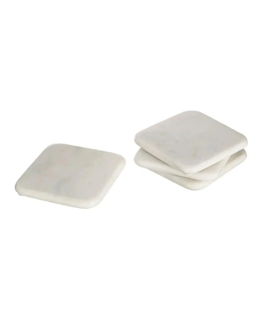 White marble coasters, set of four, for an elegant table setting
